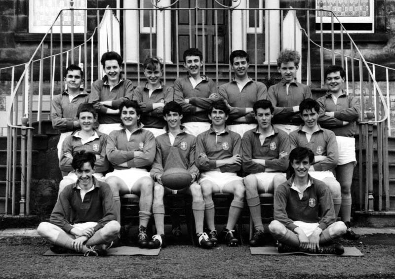 Scan1969.jpg - The 1964-65 First XVBack Row: Ian Somerville, Willie Parry, ?, Chris Pope, Hubert Ross, Sean Doull-Connolly, John CreganMiddle Row: Dermot O'Malley, John Bacigalupo, John Barry, Adrian McDonald, Glen Ross, Kenneth O'HaraFront Row: Kevin McGlaughlin, Philip Slepokura